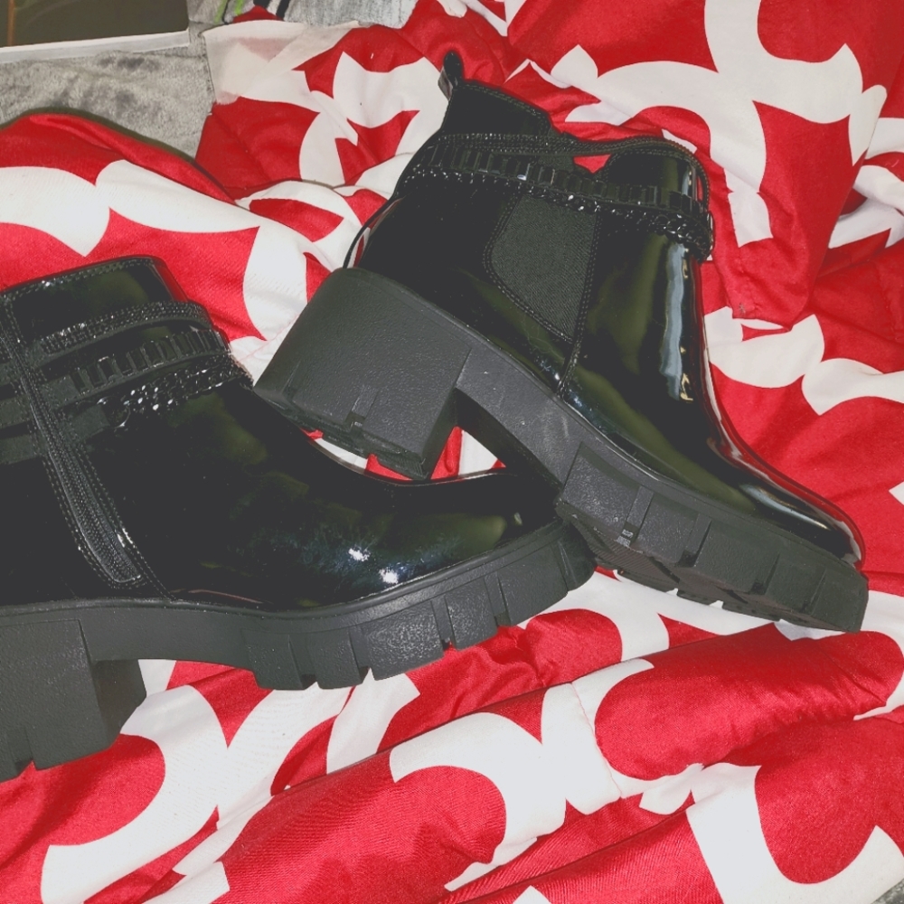 Shiny black boots